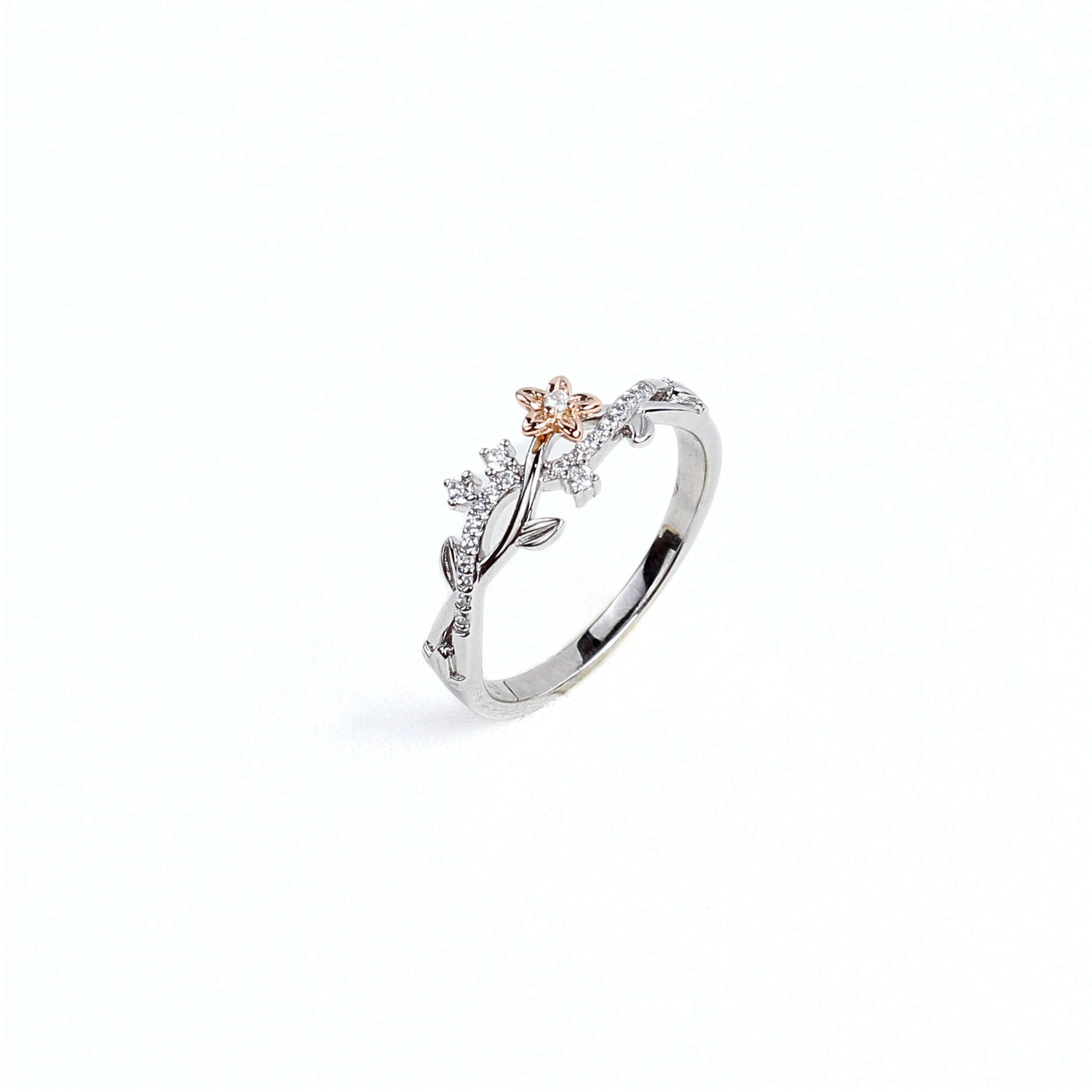 Rose Bloom Vine Ring with two-toned rhodium and rose gold plating featuring floral vine design.